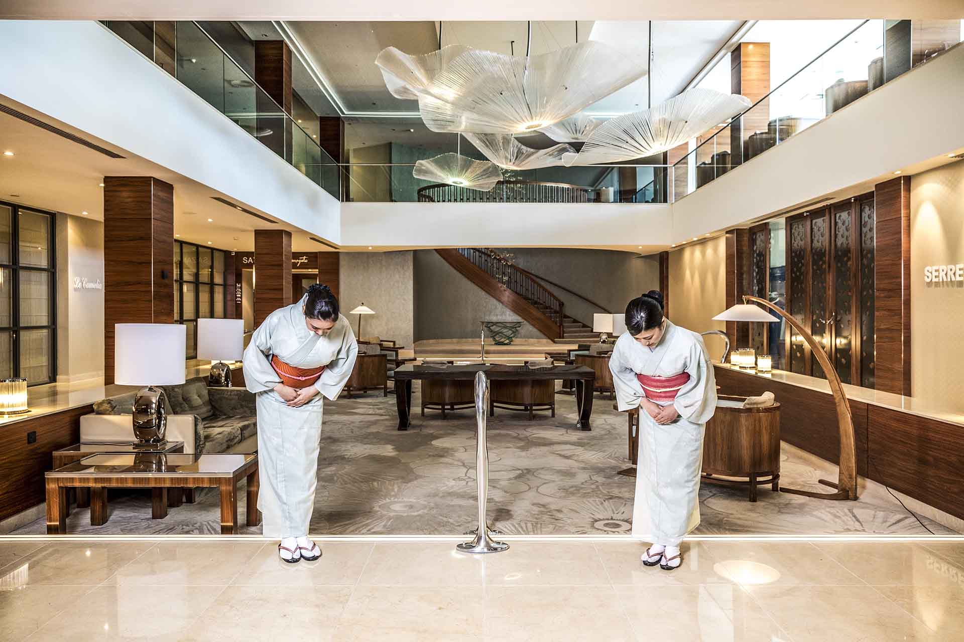 Kimono lady's bowing in lobby